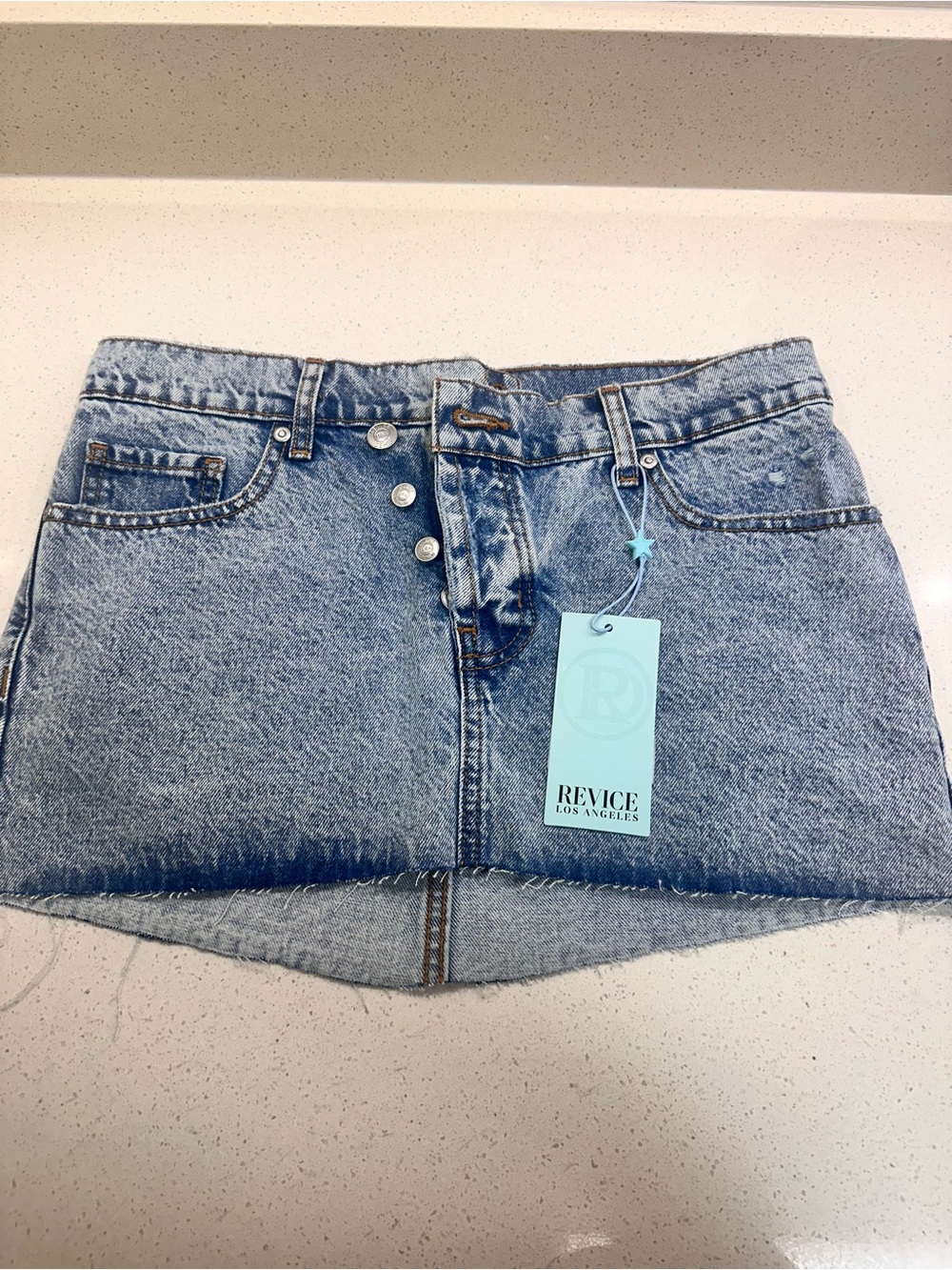 REVICE Light Blue Denim Mini Skirt